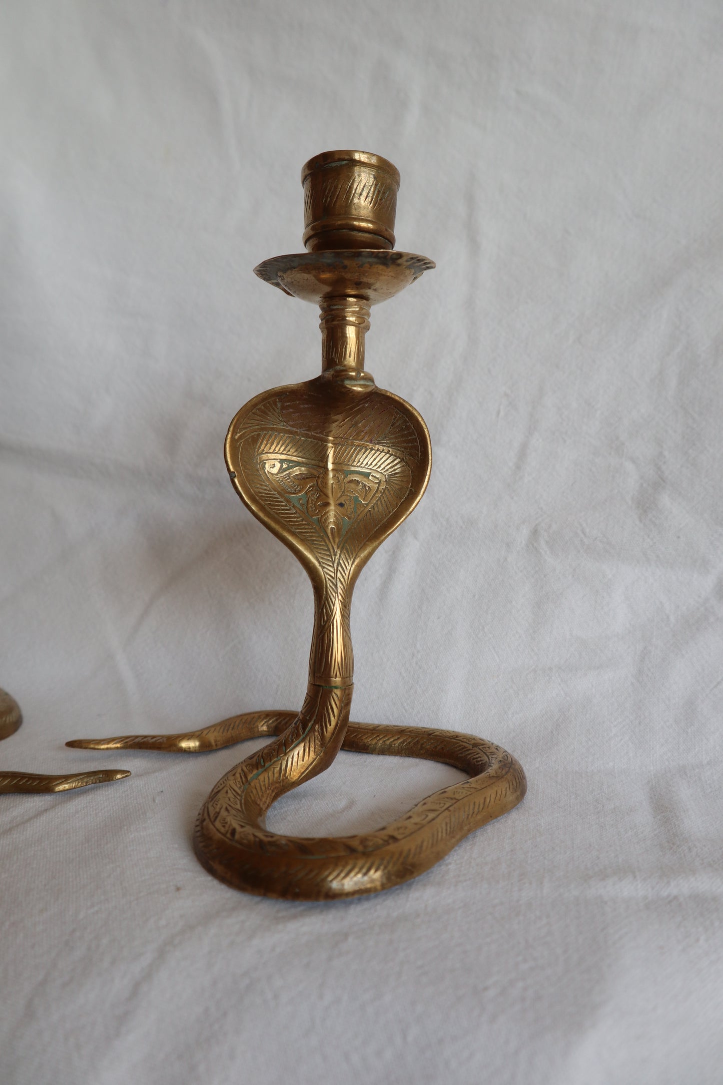 Pair of vintage brass snake candlesticks