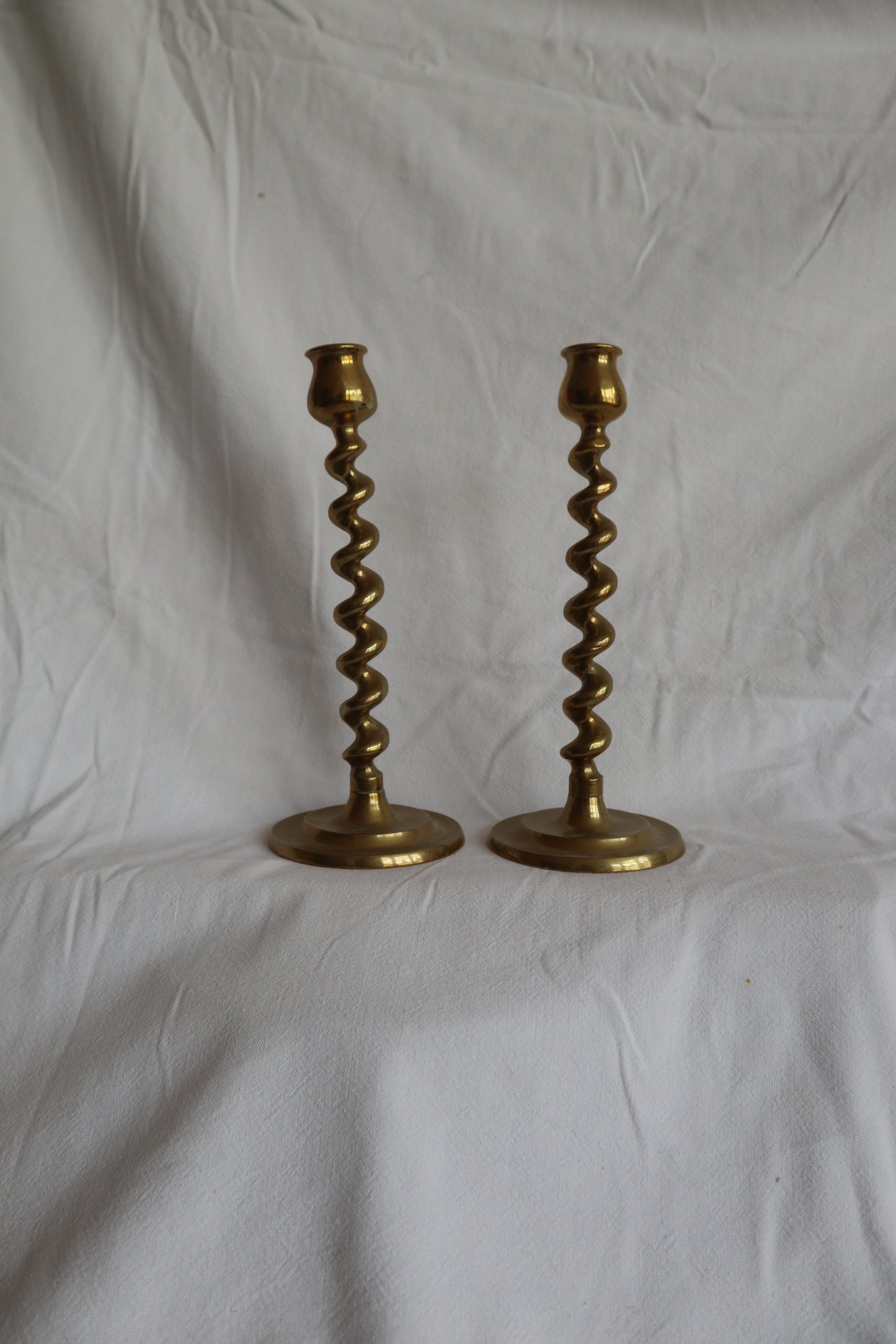 Pair of vintage twisted brass candlesticks