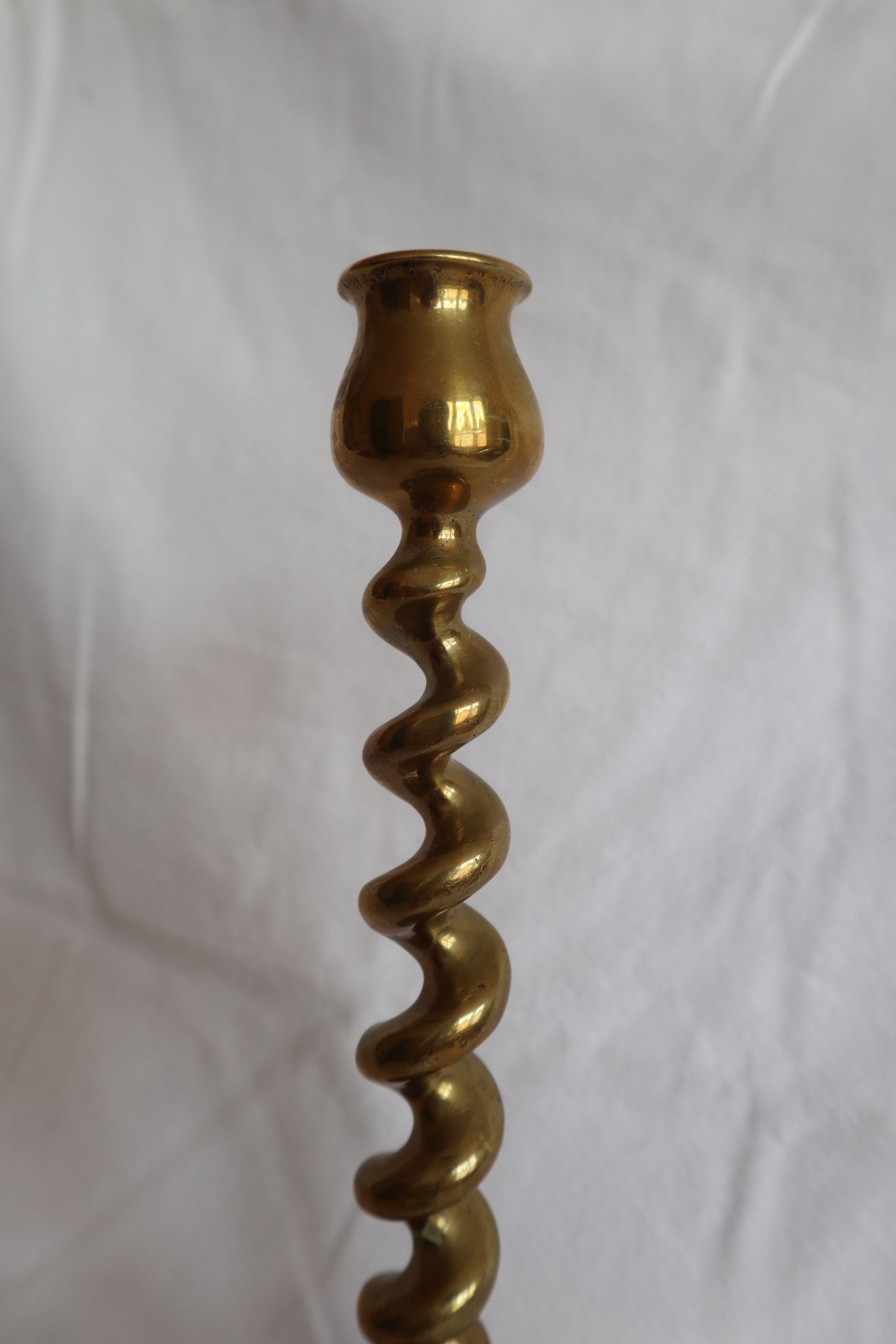 Pair of vintage twisted brass candlesticks