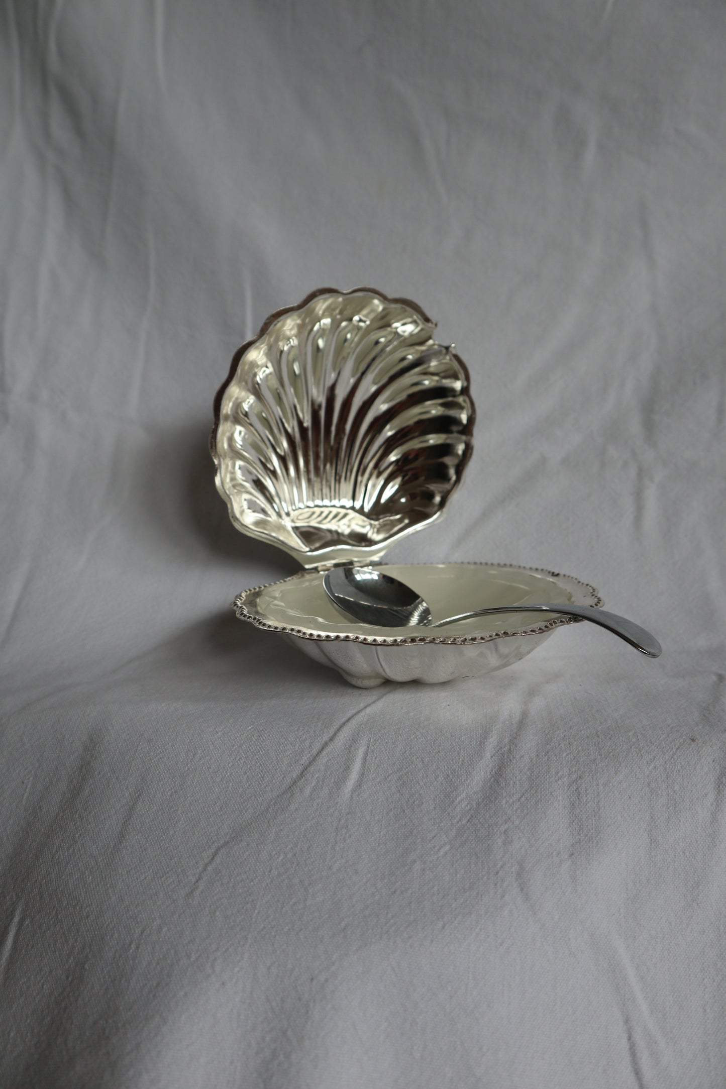 Vintage French clamshell dish with spoon