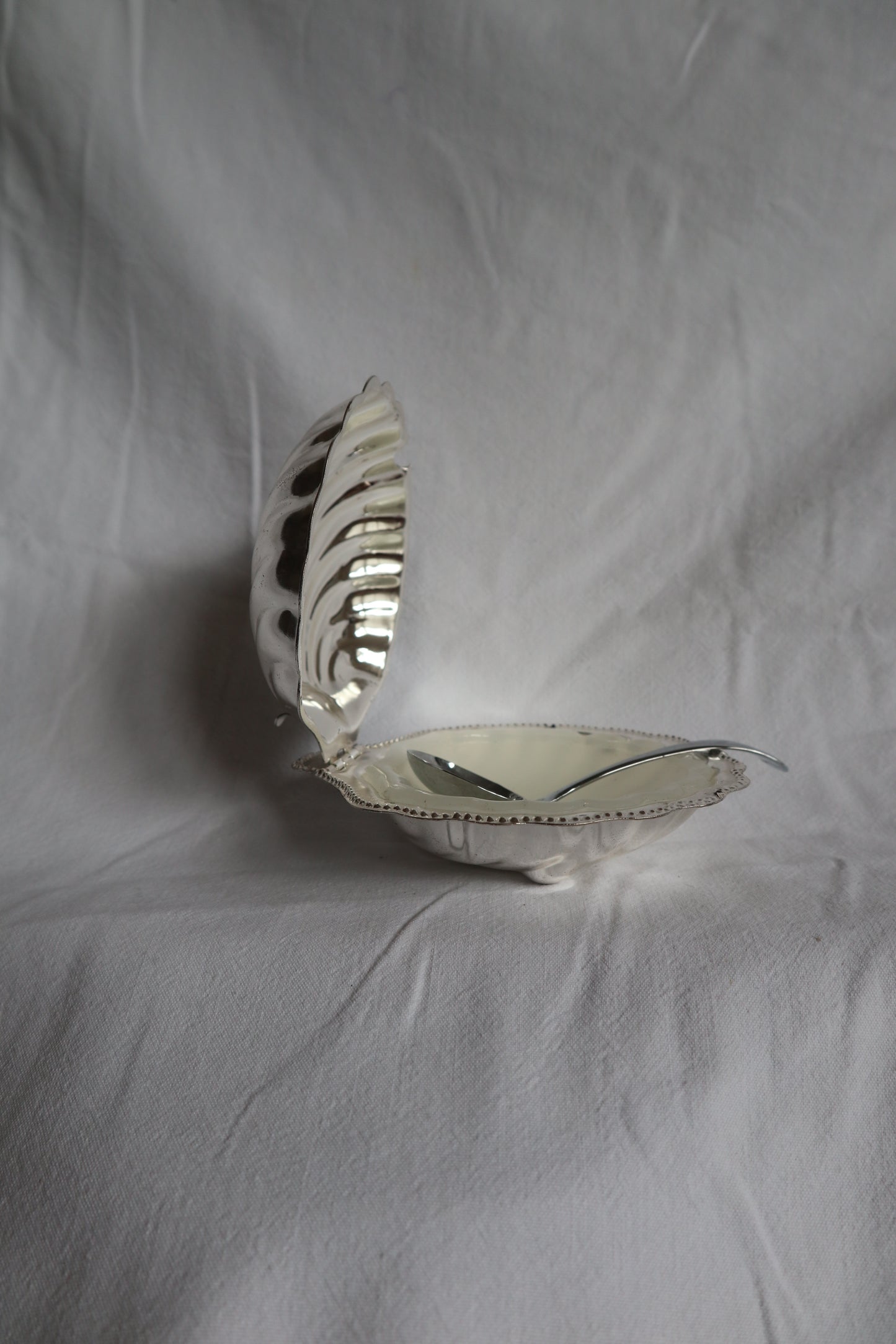 Vintage French clamshell dish with spoon
