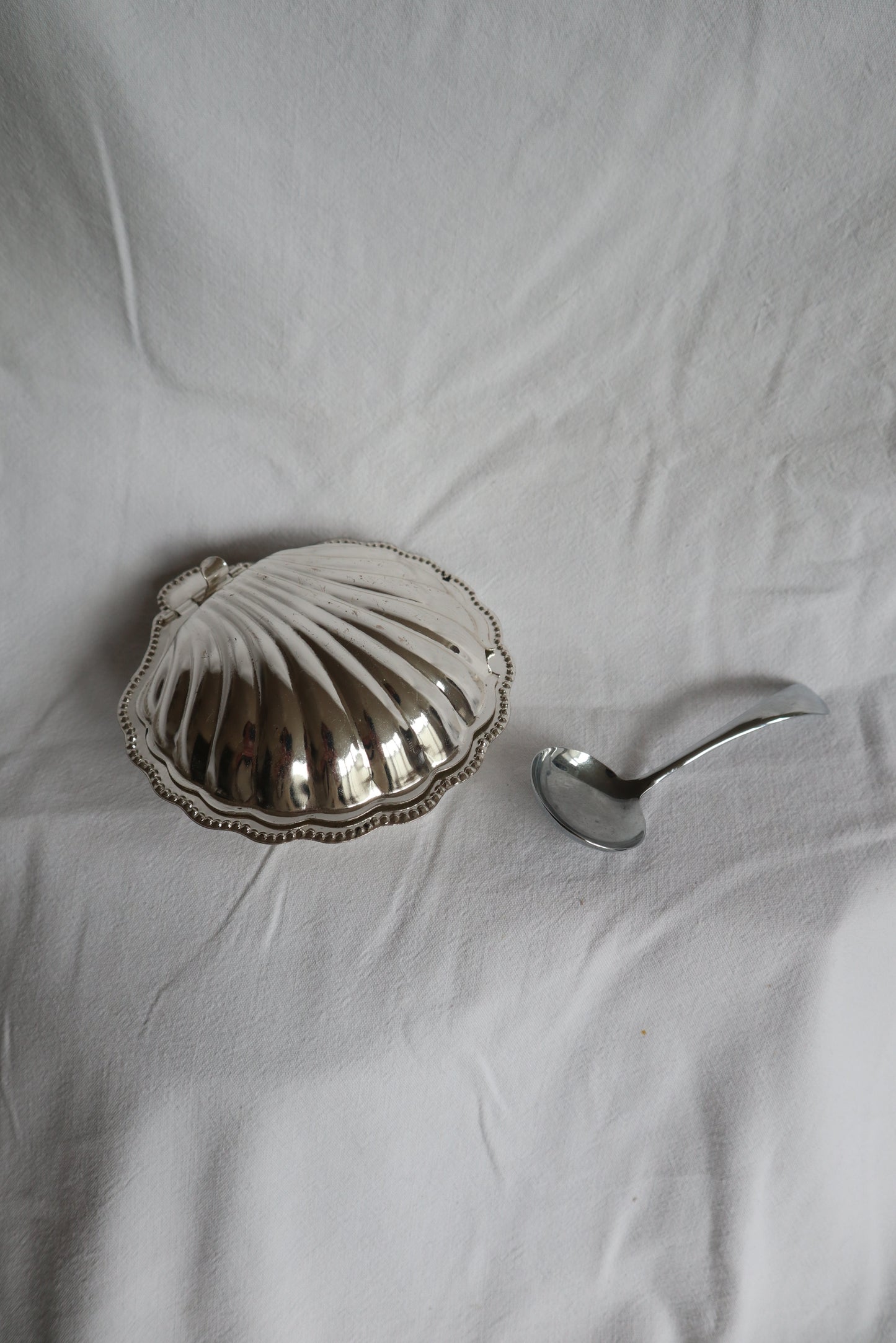 Vintage French clamshell dish with spoon