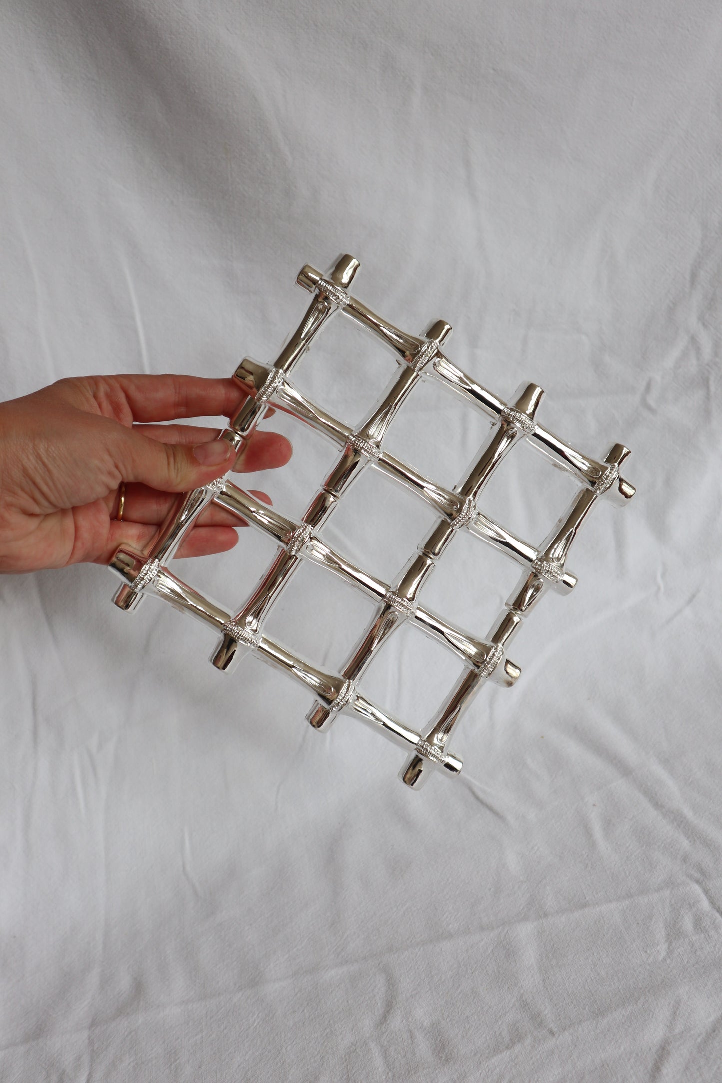 Expanding vintage silver faux bamboo trivet
