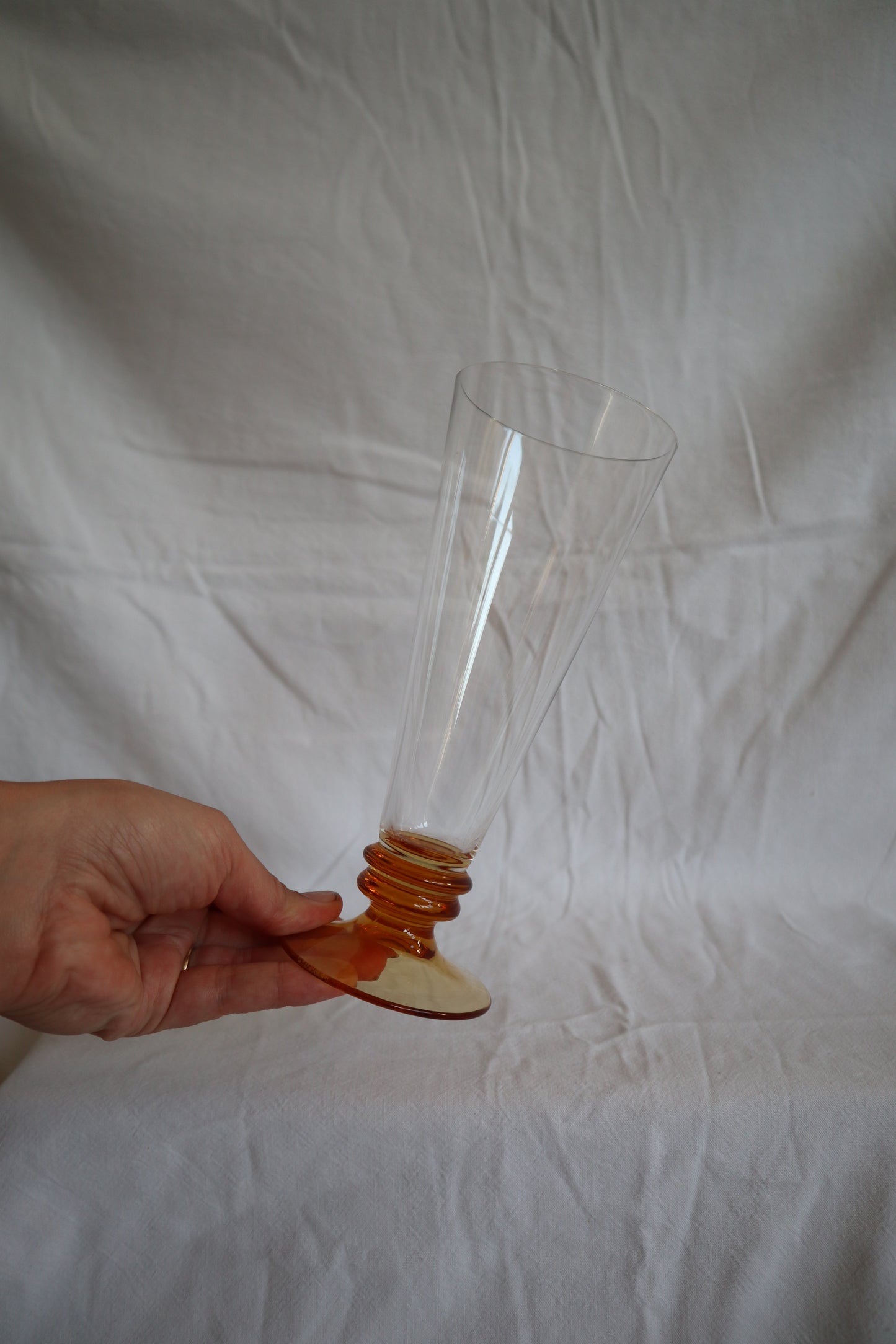 Set of 5 amber glass bobbin-stem mid century flutes
