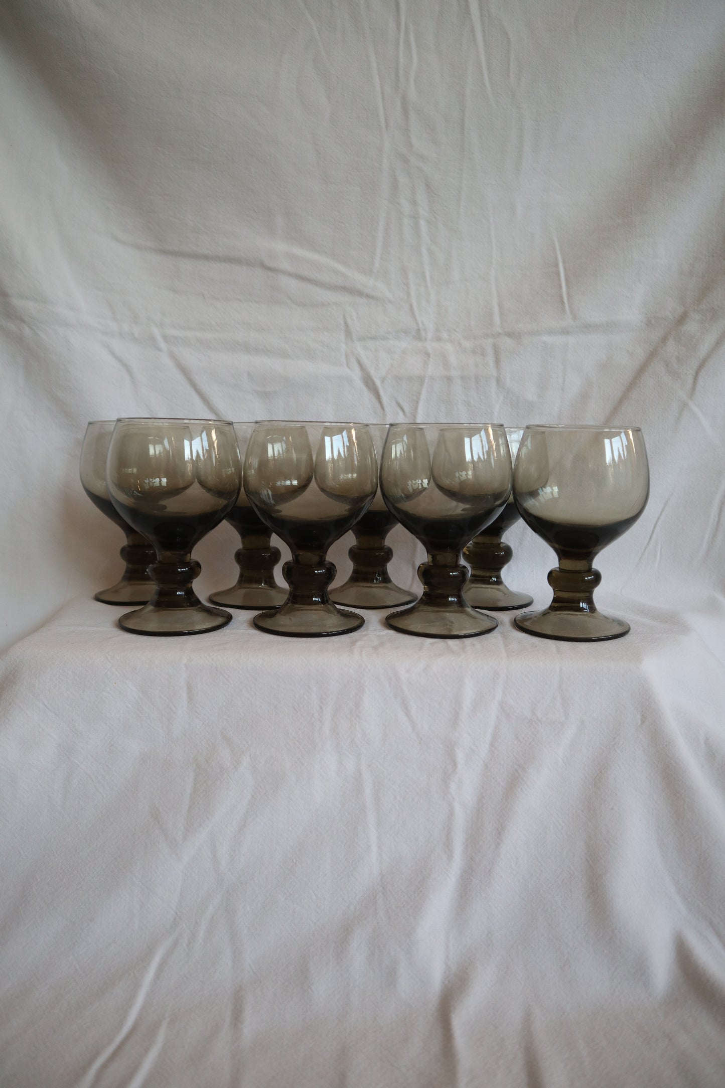 Set of 4 mid century smoked glass bobbin stem wine glasses